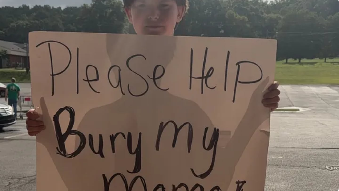 11-year-old Georgia boy holds up heartbreaking sign asking for help to bury his mom  WSB-TV Channel 2 [Video]